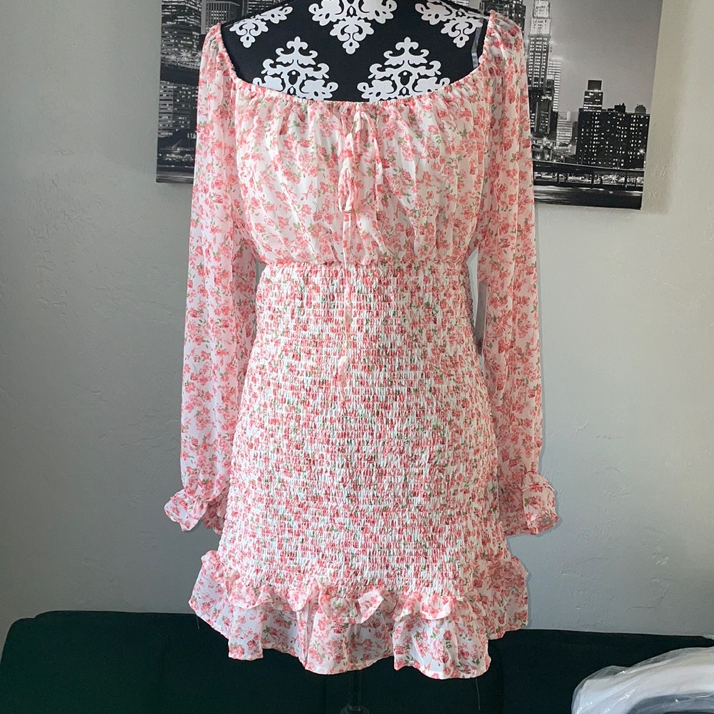 NEW 
Pink Floral dress with a smocked silhouette
